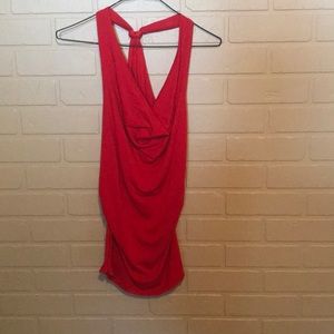 Woman’s red, open back tank top